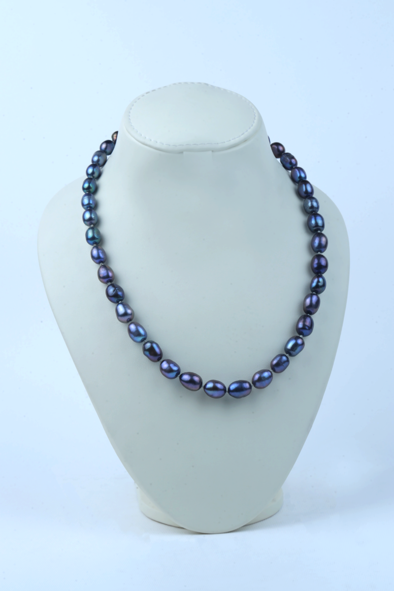 Purple colored pearl with oval shape